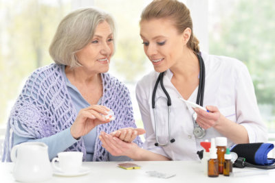 young doctor and her senior senior patient 