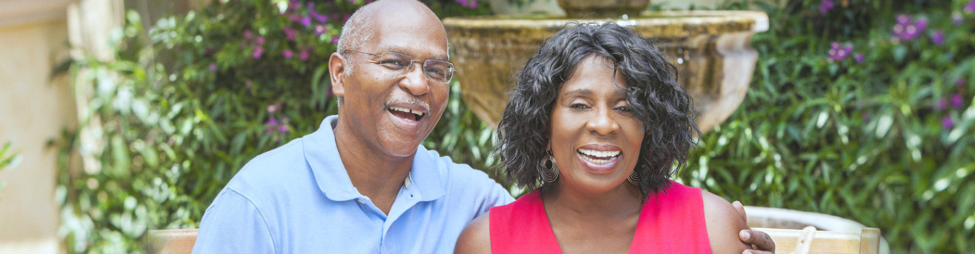 elderly couple hugging